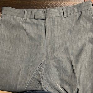 Perry Ellis Portfolio, men’s dress pants, 100% polyester.
